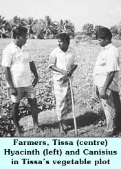 Farmers, Tissa (centre) Hyacinth (left) and Canisius in Tissa's vegetable plot