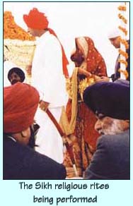 The Sikh religious rites being performed