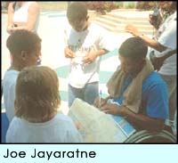 Joe Jayaratne: Signing autographa for fans at the Atlanta Paralympics