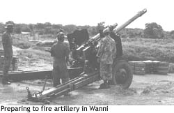 Preparing to fire artilliary in Wanni